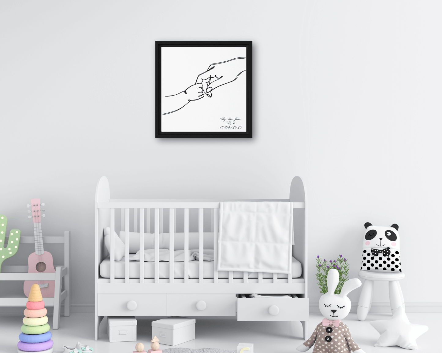 Black framed "{{product-type}}" with a personalised line art drawing of a mother's hand holding a baby's hand. The "{{title}}" design is a perfect new mum gift.