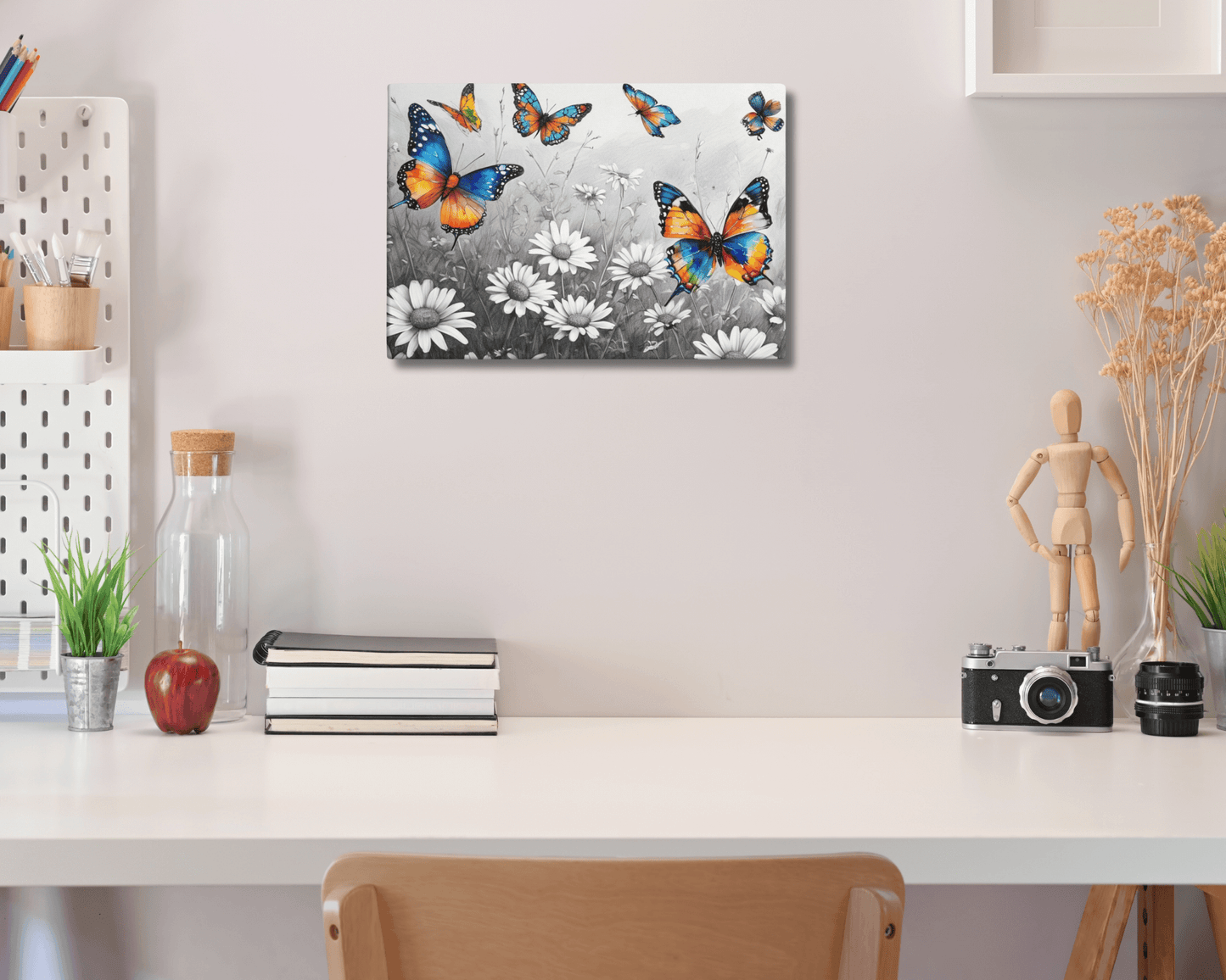 Stretched "{{product-type}}" with vibrant, colourful butterflies flying over a black and white field of daisies. The "{{title}}" design is a beautiful piece of nature-inspired wall art.