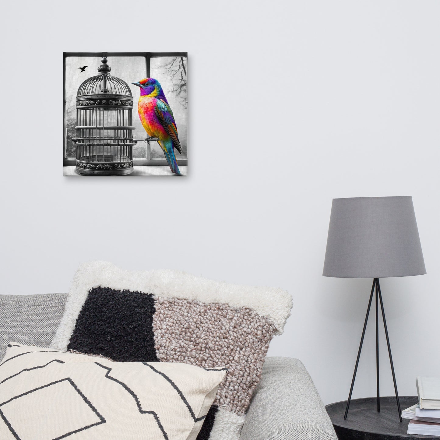 Square canvas print featuring a vibrant rainbow-colored bird with a black and white background of a birdcage. Symbolic and striking wall art for a modern living space.