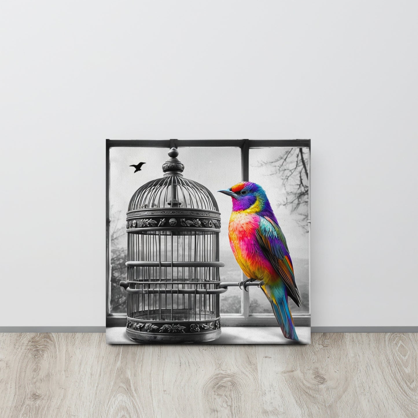 Square canvas print featuring a vibrant rainbow-colored bird with a black and white background of a birdcage. Symbolic and striking wall art for a modern living space.
