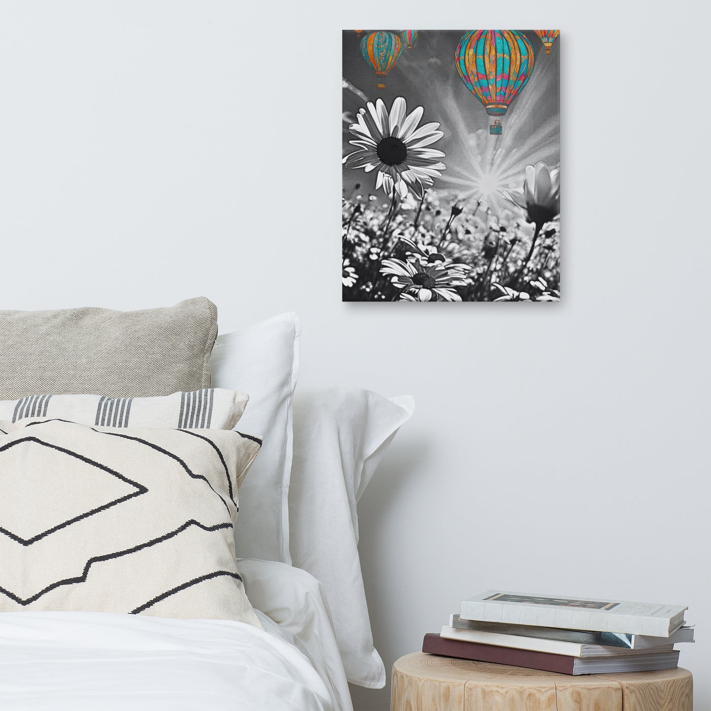 Vibrant colorful hot air balloons floating over a black and white daisy field. Unique contrast photography art print for modern and eclectic home decor.