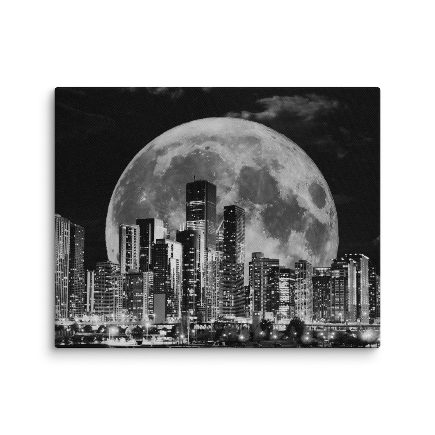 Canvas art titled 'Cityscape Moonlight,' featuring a black and white skyline illuminated by moonlight, perfect for modern urban and minimalist home decor.