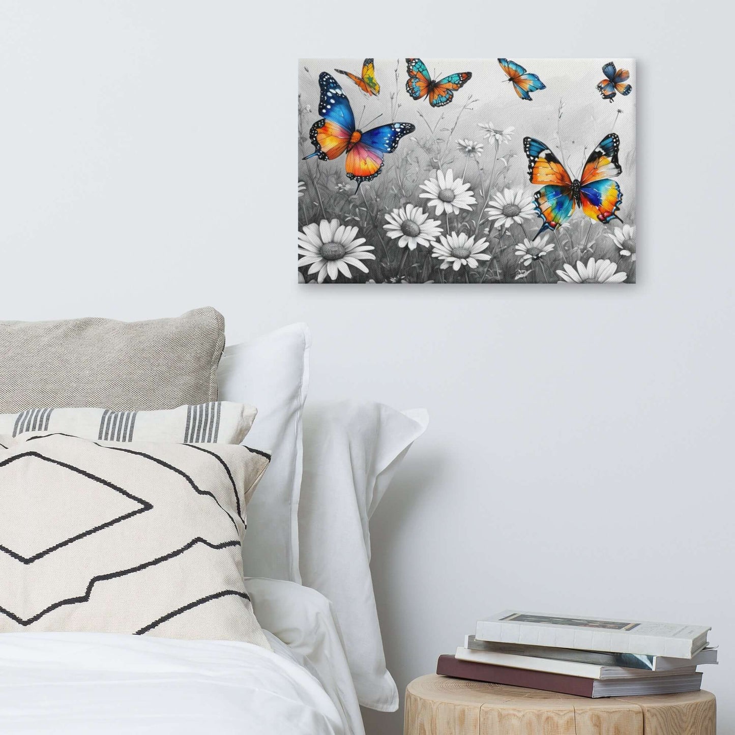 Stretched "{{product-type}}" with vibrant, colourful butterflies flying over a black and white field of daisies. The "{{title}}" design is a beautiful piece of nature-inspired wall art.