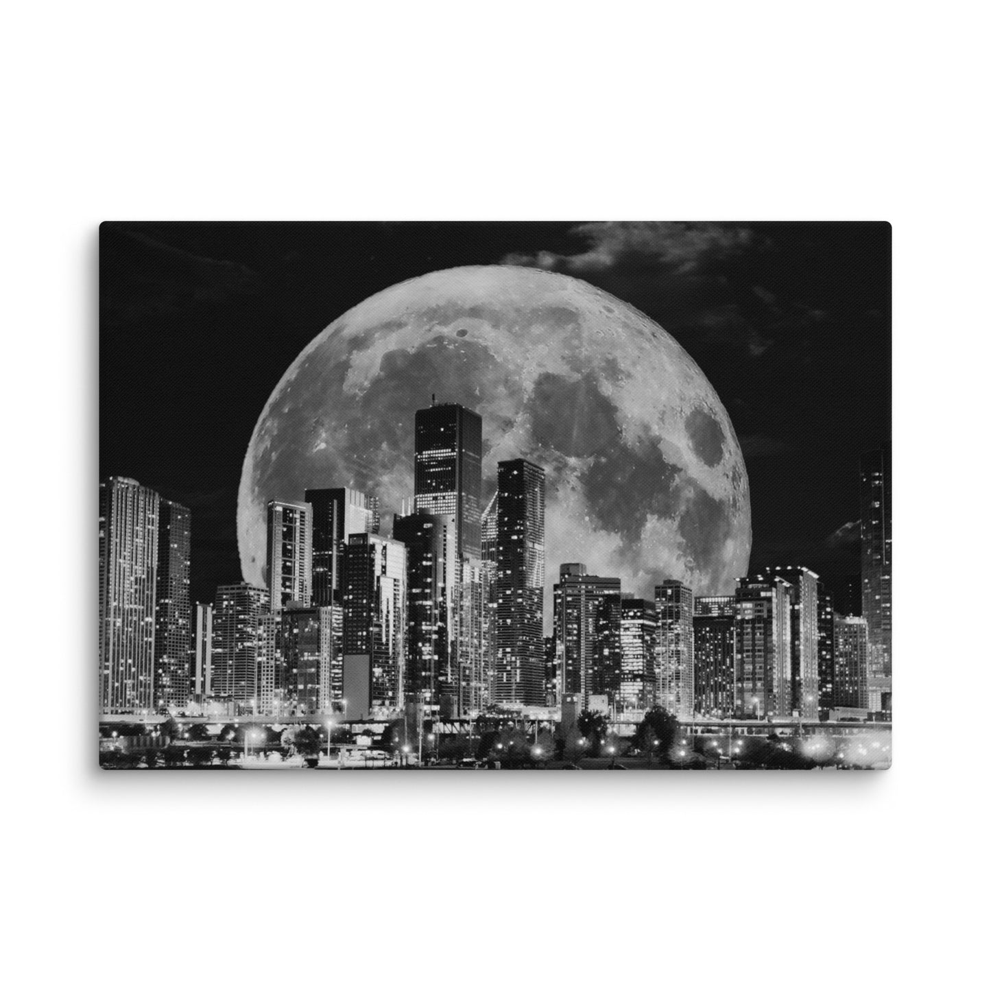 Canvas art titled 'Cityscape Moonlight,' featuring a black and white skyline illuminated by moonlight, perfect for modern urban and minimalist home decor.