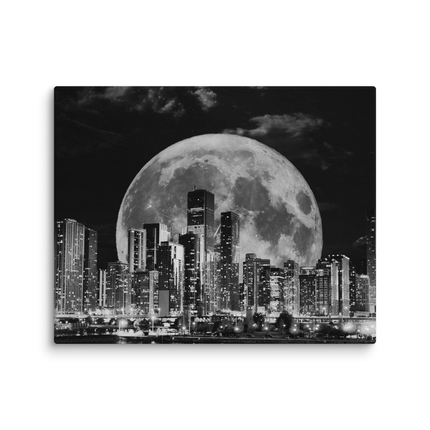Canvas art titled 'Cityscape Moonlight,' featuring a black and white skyline illuminated by moonlight, perfect for modern urban and minimalist home decor.