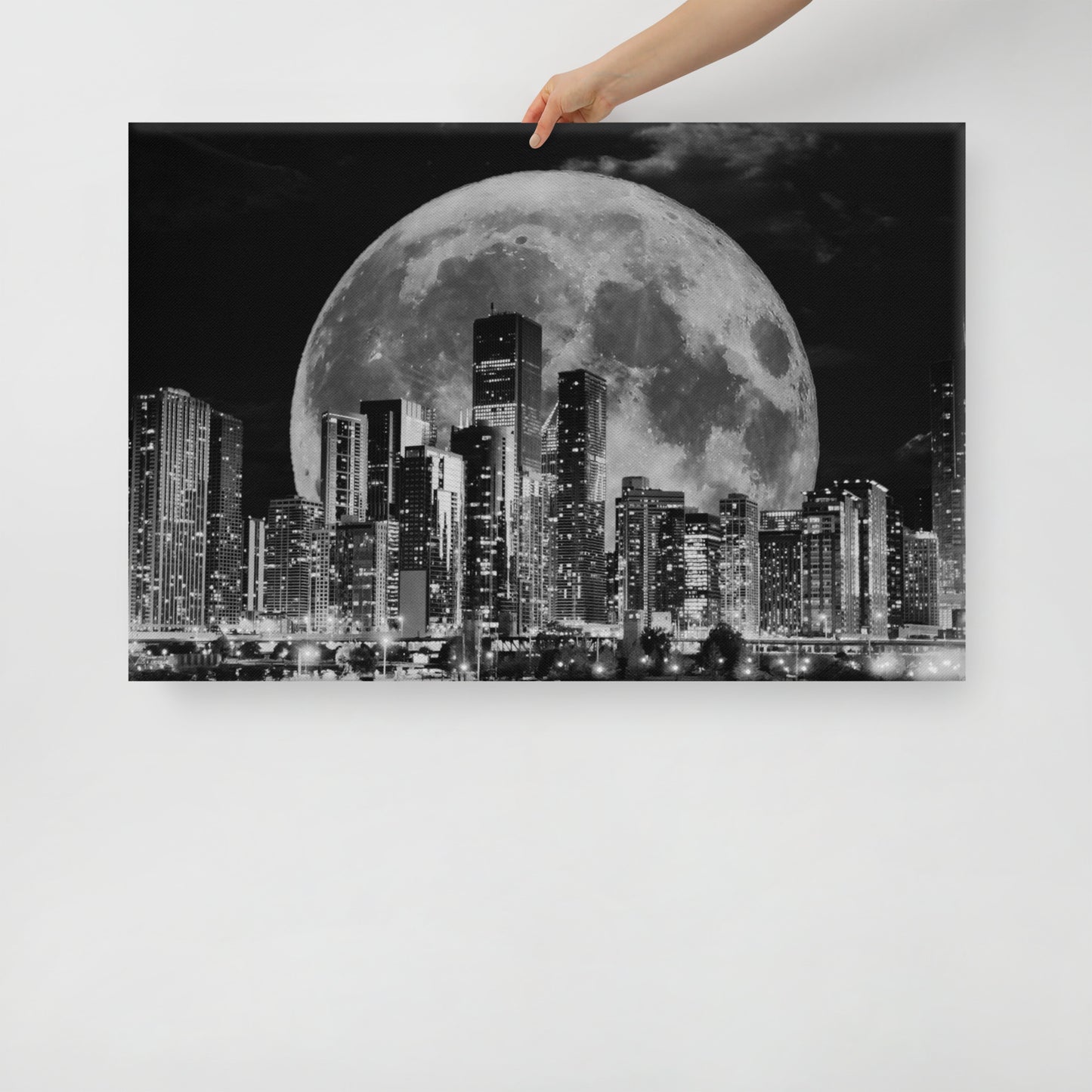 Canvas art titled 'Cityscape Moonlight,' featuring a black and white skyline illuminated by moonlight, perfect for modern urban and minimalist home decor.