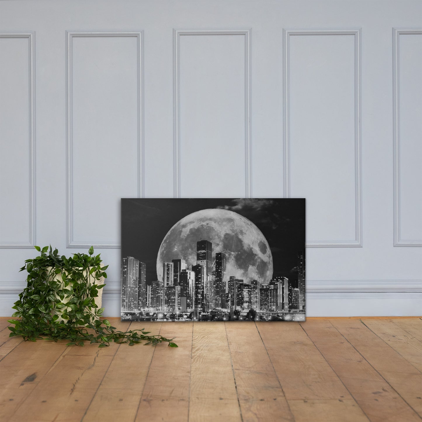 Canvas art titled 'Cityscape Moonlight,' featuring a black and white skyline illuminated by moonlight, perfect for modern urban and minimalist home decor.