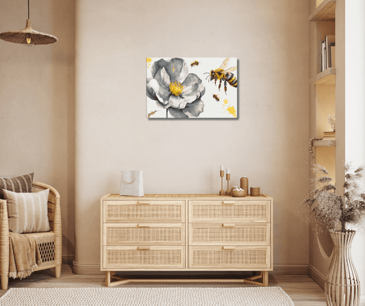 Stretched "{{product-type}}" with a beautiful watercolour design of a busy bee next to a grey flower. The "{{title}}" art is perfect for adding a touch of nature and purpose to a room.