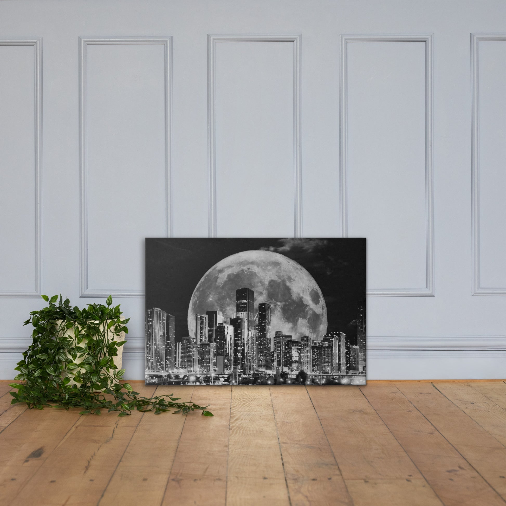 Canvas art titled 'Cityscape Moonlight,' featuring a black and white skyline illuminated by moonlight, perfect for modern urban and minimalist home decor.