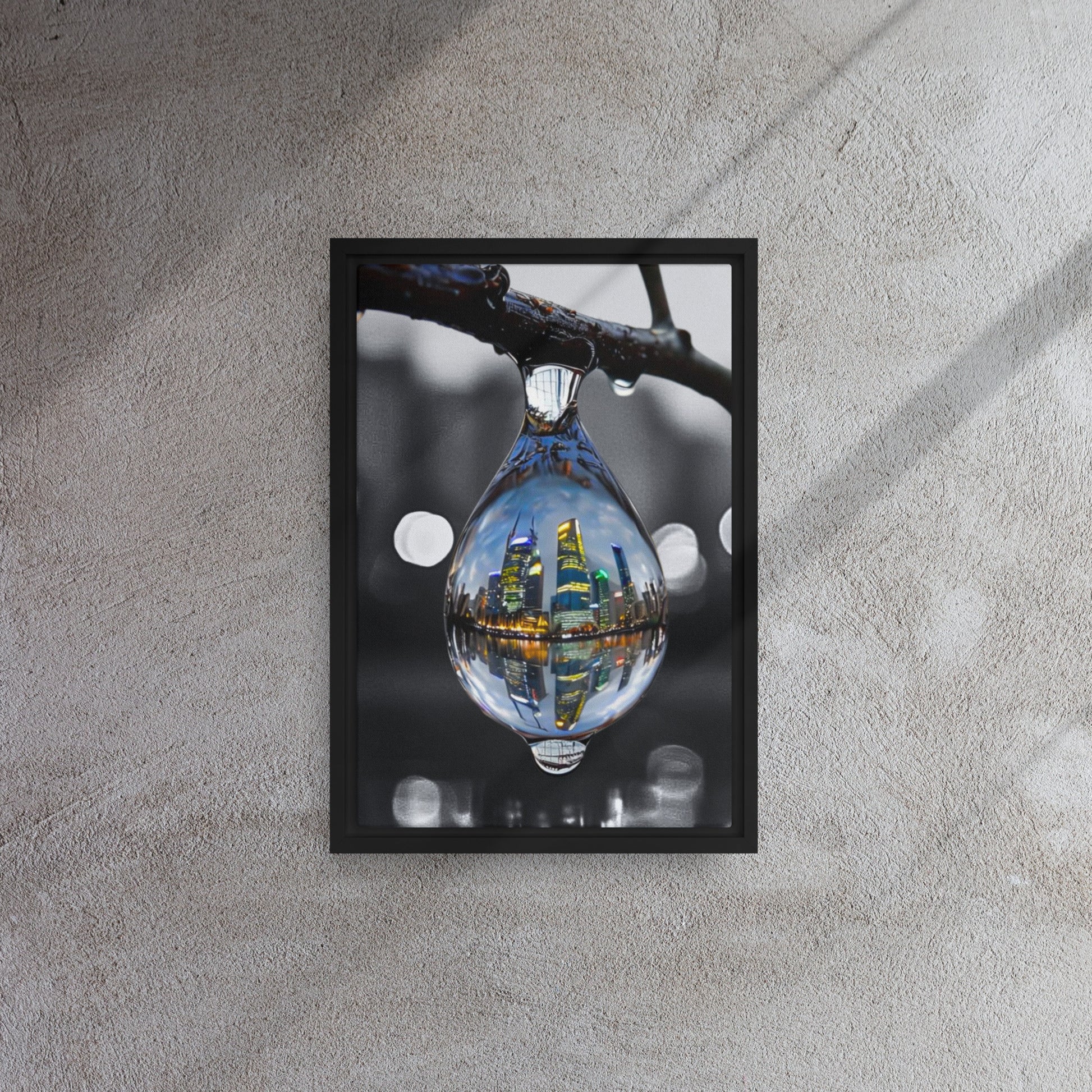 Framed canvas art print of a colorful city skyline reflected in a water droplet. Features unique abstract photography with vibrant colors against a monochrome background. Modern and stylish wall decor.