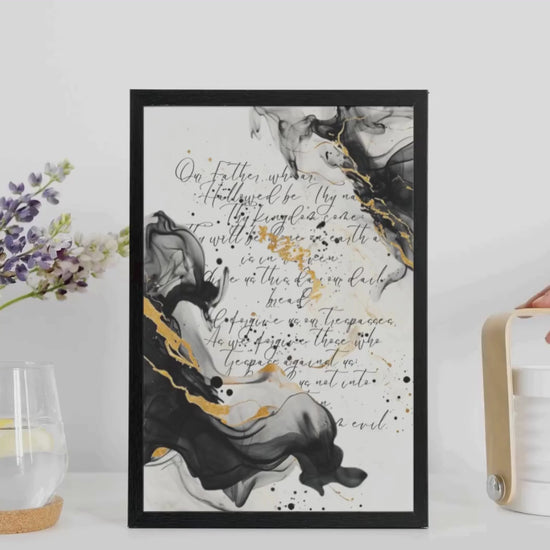 Framed scripture art poster with black and gold abstract marble design. Features the Lord's Prayer in elegant calligraphy. Ideal for religious home decor and inspirational wall art.